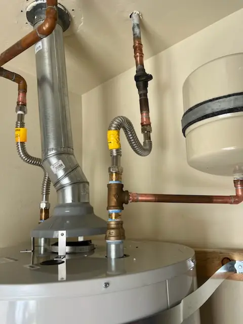 Water heater installation and plumbing repair in Farm School
